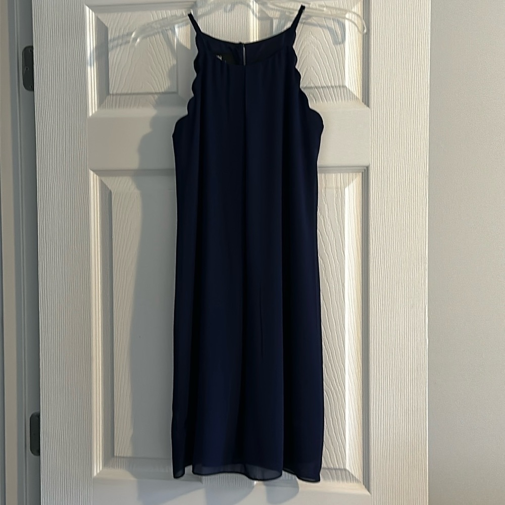 Navy blue dress, 29 inches in length, right above the knee